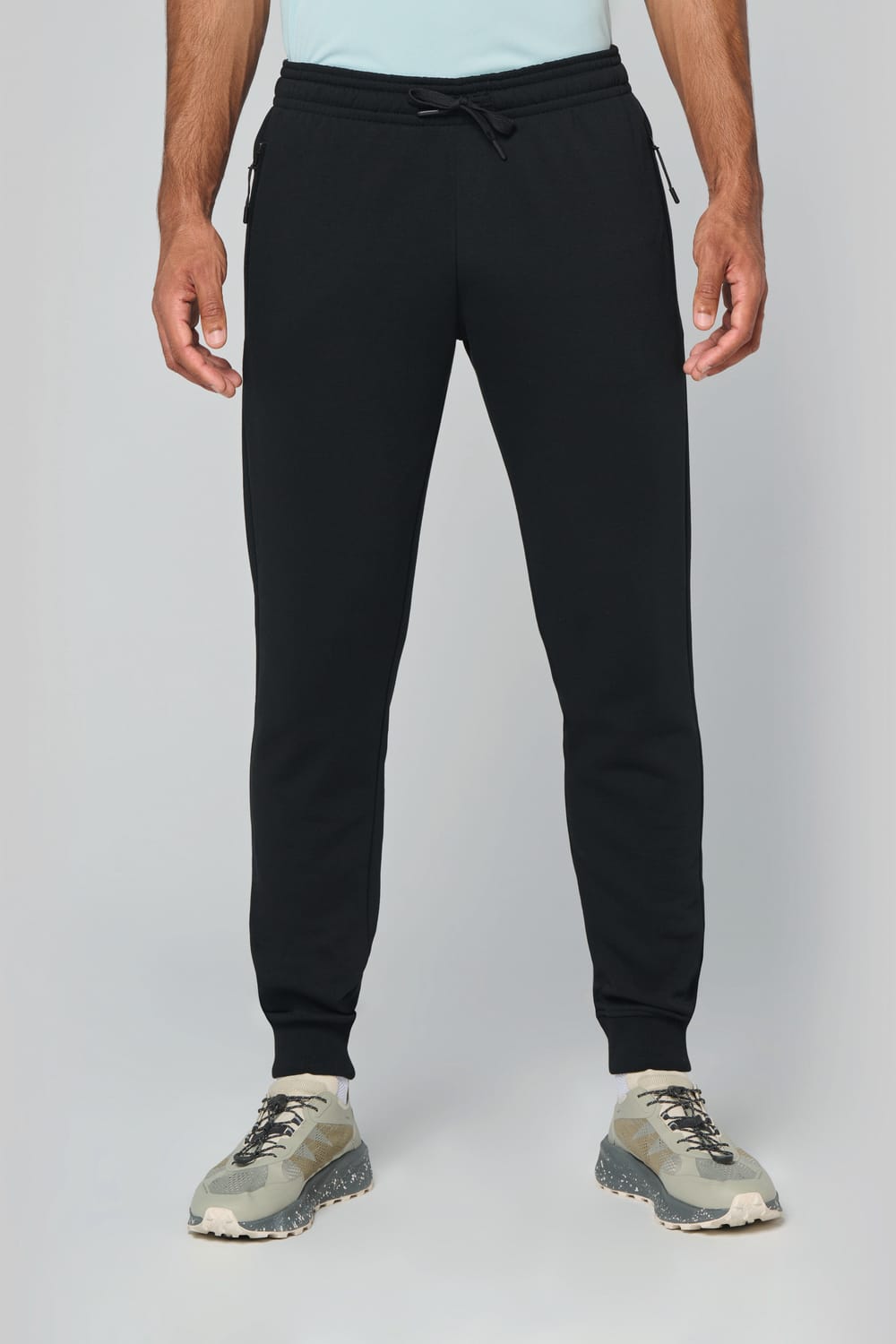 Pantalón de chándal multideporte con bolsillos adulto