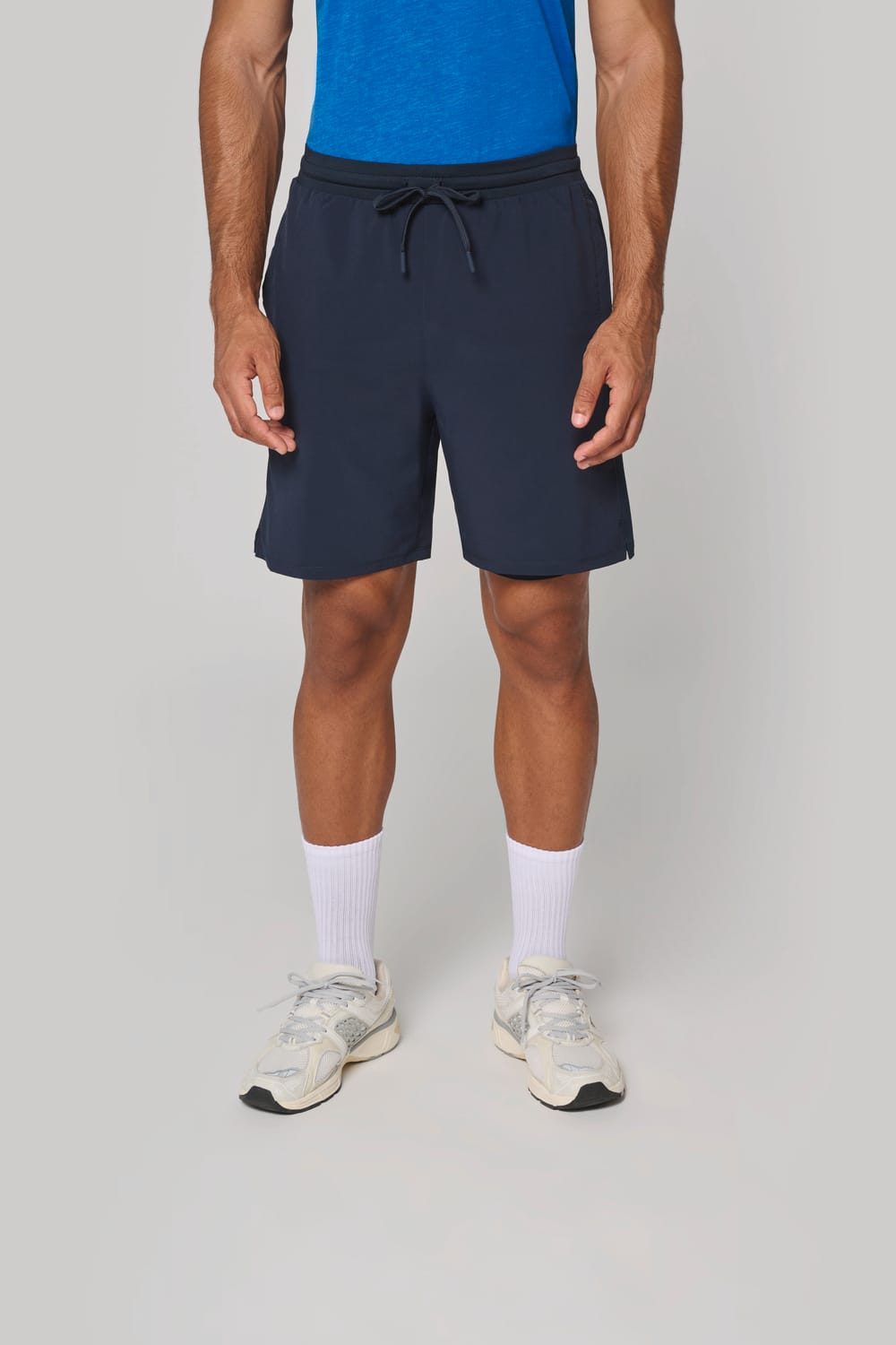 Short 2 en 1 con short interior integrado hombre