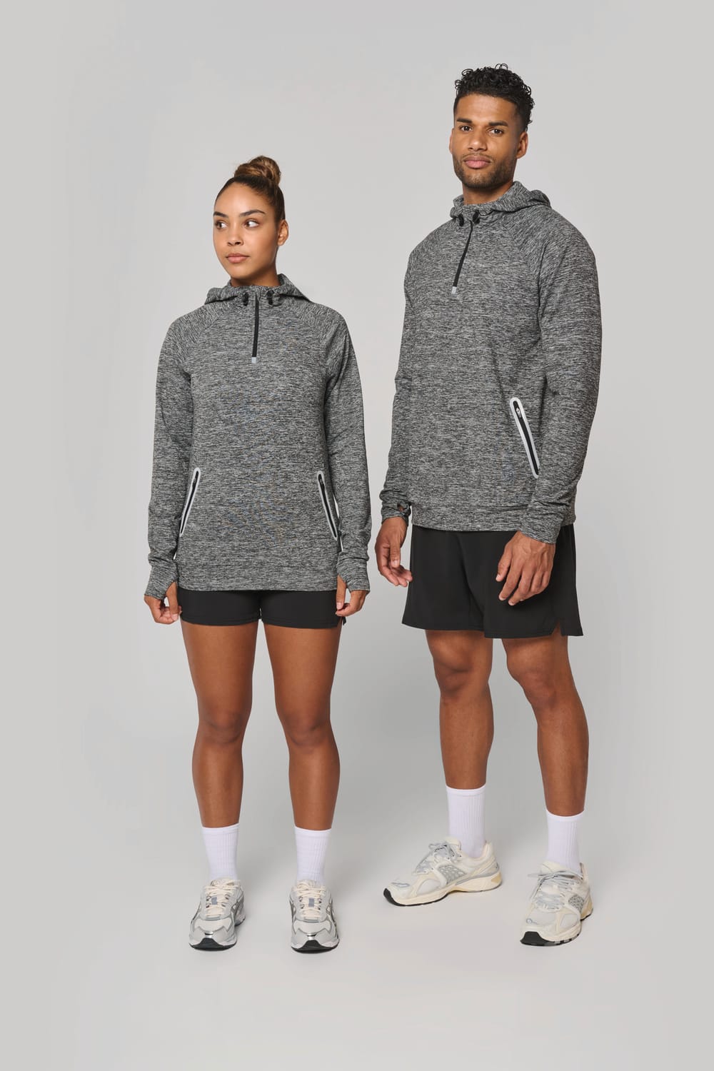 Sudadera deportiva capucha 1/4 cremallera unisex